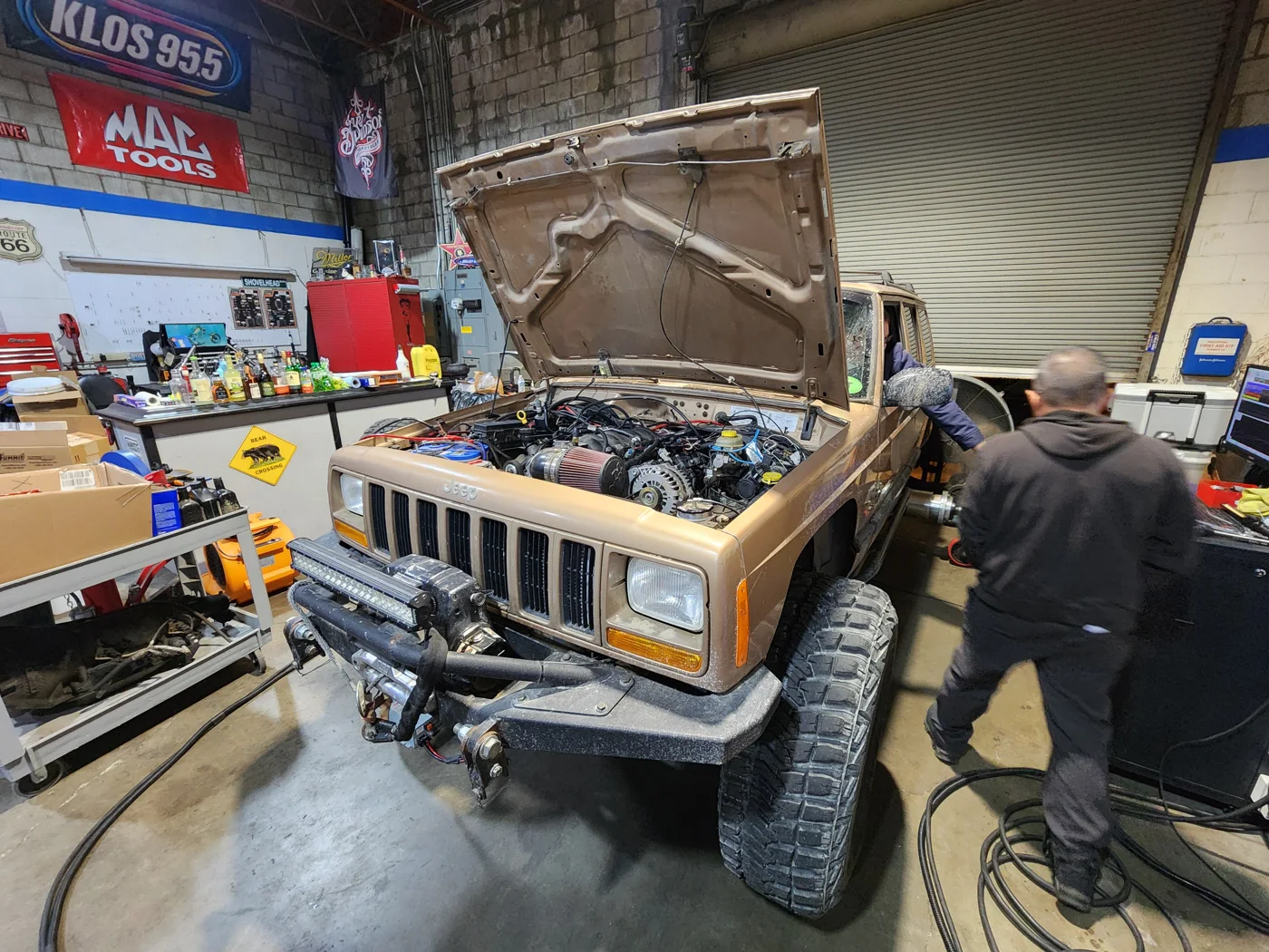 LS-swapped Cherokee with its hood open at the previous California shop